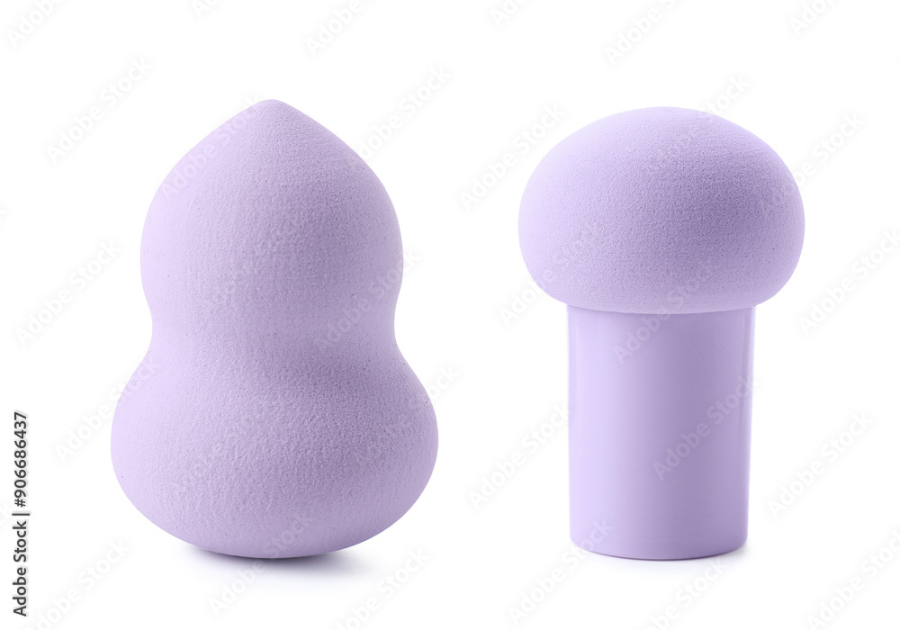 Two different violet makeup sponges isolated on white Two different violet makeup sponges isolated on white