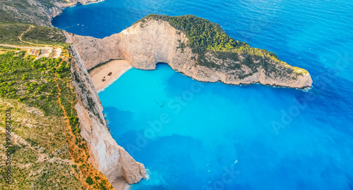 Zakynthos, Greece. Navagio Beach with sjipwreck in Ionian Sea. Beautiful views of azure sea water and nature with cliffs cave. Boat trip