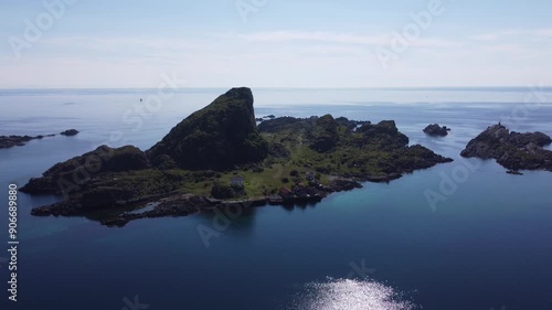 Aerial view of Norwegian fjord landscape in the Lofoten island with wooden cabins in coastal towns in Mortsund photo