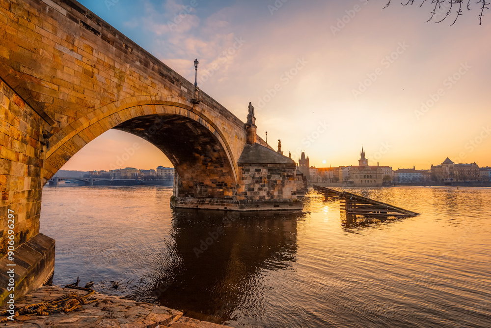 Obraz premium View of the city of Prague and the Vltava river with Old Town Bridge Tower on Charles bridge in Prague, Czech Republic.