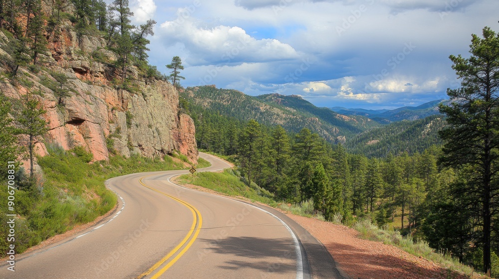 Fototapeta premium Serpentine Journey: Curvy Mountain Road in Pine Forest - Adventure and Exploration Concept