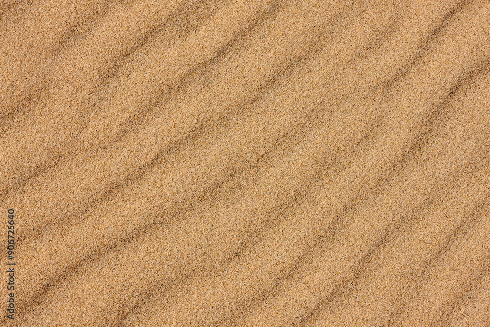 The rippled beach sand, partially frozen, runs diagonally on the beach at Harrington Beach State Park, Belgium, Wisconsin in late November The rippled beach sand, partially frozen, runs diagonally on the beach at Harrington Beach State Park, Belgium, Wisconsin in late November