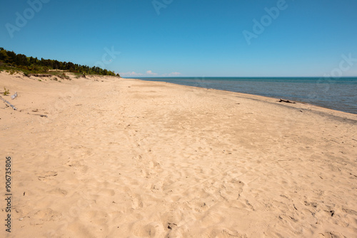 No one on the beach at Point Beach State Park, Two Rivers, Wisdconsin in the morning in early June photo