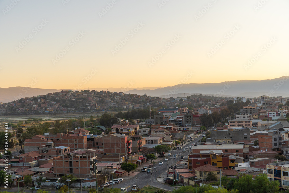 Panoramic view of the city of Cochabamba in Bolivia at sunset, surrounded by mountains. Panoramic view of the city of Cochabamba in Bolivia at sunset, surrounded by mountains.