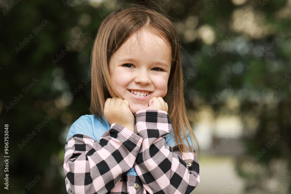 Portrait of happy little girl outdoors. Cute child Portrait of happy little girl outdoors. Cute child