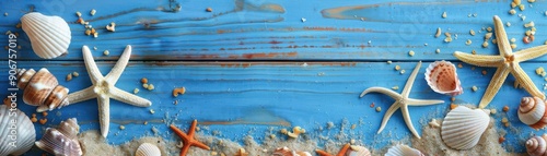 A collection of seashells and starfish arranged on a blue wooden plank background, with scattered sand, creating a coastalthemed display that evokes memories of the beach photo