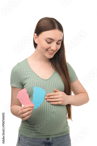 Expecting twins. Pregnant woman holding two paper cutouts of feet on white background