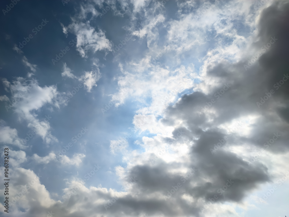 The sky, adorned with the sun hidden behind wispy clouds, creates a mesmerizing play of light and shadow. The sky, adorned with the sun hidden behind wispy clouds, creates a mesmerizing play of light and shadow.