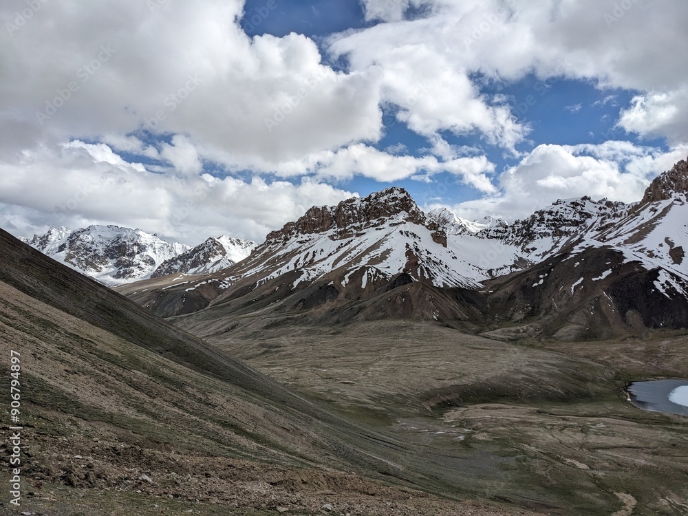 Fototapeta premium Breathtaking Views of Shimshal Pass in the Pamir Mountains. Shimshal Valley is a remote and breathtakingly beautiful area known for its high-altitude landscapes, rugged mountains, and many more.