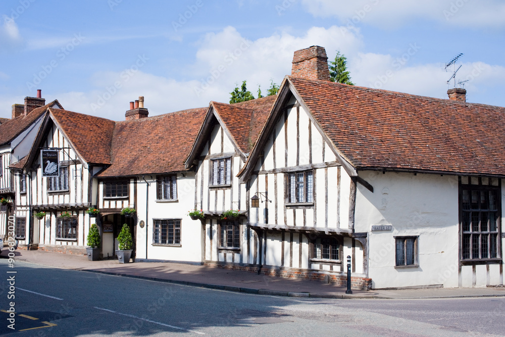 The famous Swan Inn in the High Street of this medieval wool town of timber-framed houses mostly dating from the 15th century, Lavenham, Suffolk, England, United Kingdom, Europe The famous Swan Inn in the High Street of this medieval wool town of timber-framed houses mostly dating from the 15th century, Lavenham, Suffolk, England, United Kingdom, Europe