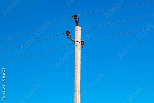 power electric pole with stretched wires.