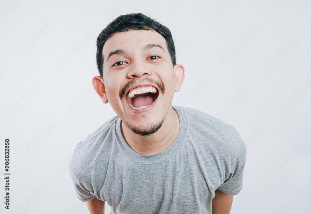 close up photo, Shocked and surprised face of asian man jumping out isolated on white. close up photo, Shocked and surprised face of asian man jumping out isolated on white.