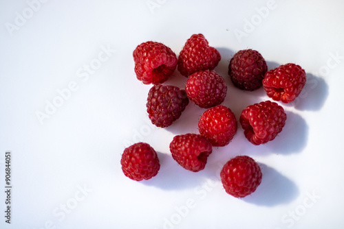 red raspberry on a white background