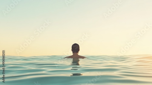 Wallpaper Mural Serene Sunset Silhouette of Female in Calm Waters, Peaceful Evening Vibe on Minimalist Pastel Beach Torontodigital.ca