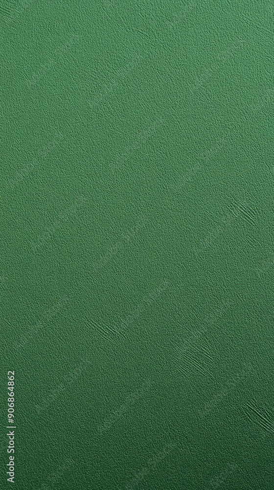 Fototapeta premium Lush green textured surface ideal for various creative design applications