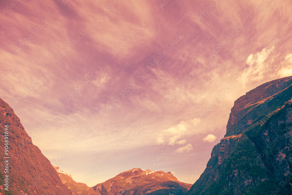 Fototapeta premium Mountain range against the sunset sky