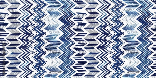 Summery ikat zig zag border pattern in painterly brushstroke digital design. Modern coastal living printed textile decor in seamless banner tape template. photo