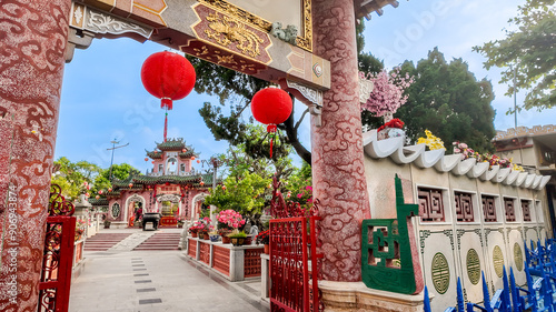 Chinese temple adorned with red lanterns and intricate decorations during Lunar New Year, symbolizing cultural heritage and celebration