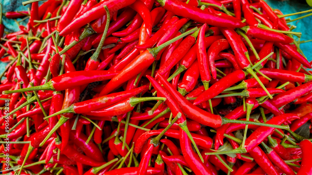 Close-up of vibrant red chili peppers, perfect for spice-related content or Mexican cuisine themes, highlighting organic farming and cooking Close-up of vibrant red chili peppers, perfect for spice-related content or Mexican cuisine themes, highlighting organic farming and cooking