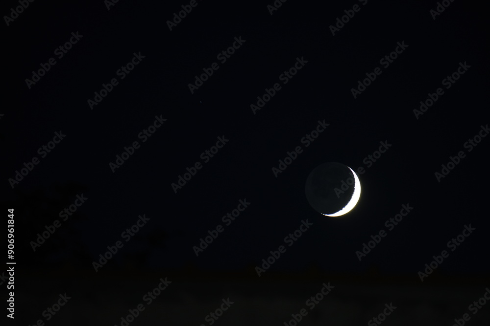 Crescent Moon is in black sky, close up astronomic photo Crescent Moon is in black sky, close up astronomic photo