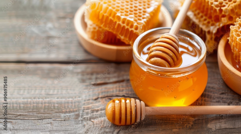 Natural Honey in Jar With Honeycomb on Rustic Wooden Table Natural Honey in Jar With Honeycomb on Rustic Wooden Table