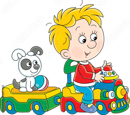 Happy little boy playing wi...