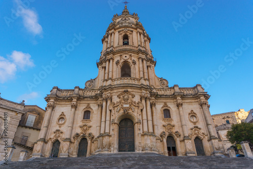 Facade of the beautiful sicilian baroque church Duomo of San Giorgio on a sunny day, Modica, Sicily, Italy