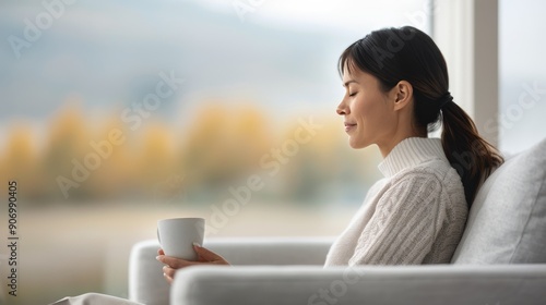 Thoughtful Woman in Cozy Sweater Reflects in Bright Living Room During Daytime