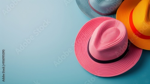 Colorful Straw Hats Arranged Neatly on a Blue Background
