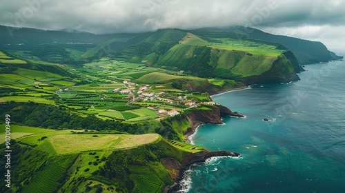 Aerial view of lush greenery and village coastline, Graciosa Island, Portugal. photo