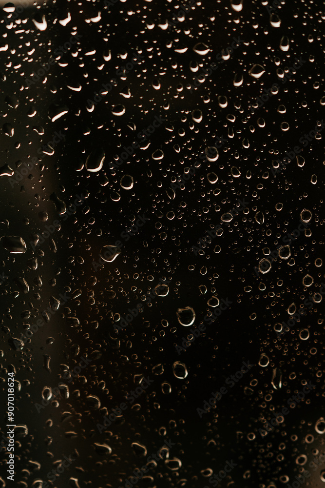 water drops on black background water drops on black background