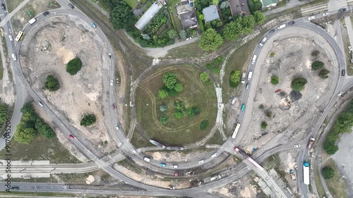 Reconstruction of a large roundabout. Reconstruction of the road and streets on a large roundabout. Roundabout in Bedzin, Poland. Aerial drone view of the reconstruction of the roundabout, roadworks. photo