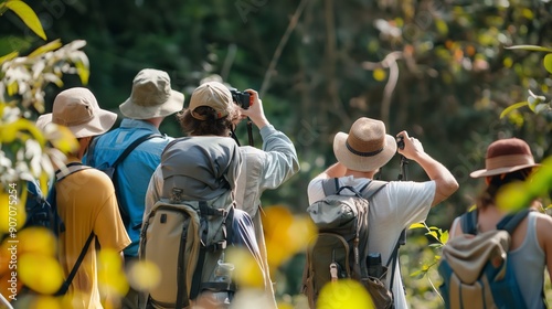 A group of birdwatchers identifying different species of birds