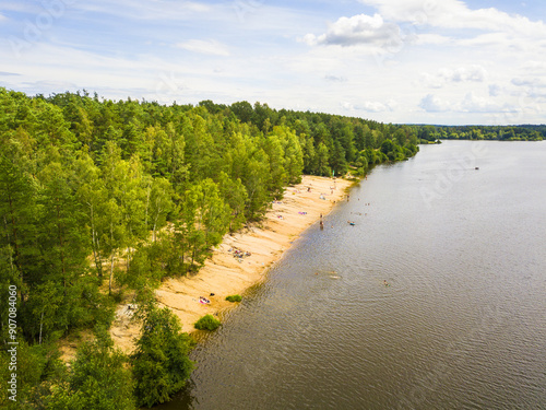 Aerial view of beach on a lake. Reclaimed sand pit and popular tourists destination piskovna Vlkov near Veseli nad Luznici. South Bohemia, Czech republic, European union. photo