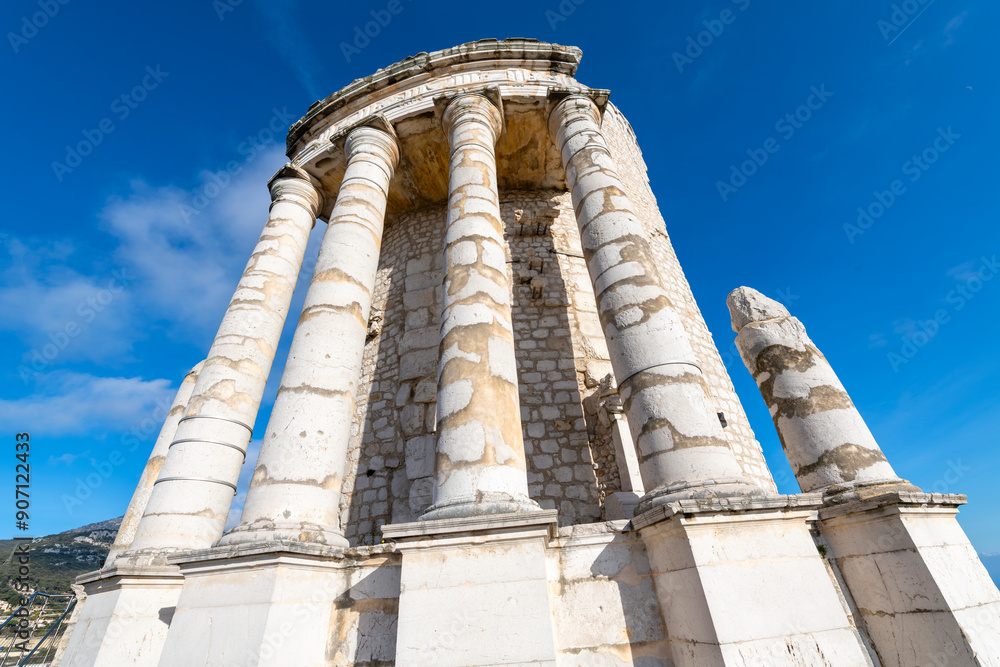 The ancient Roman ruins of the Trophy of Augustus, or Tropaeum Alpium, a hilltop marble monument in the village of La Turbie, France, along the French Riviera. The ancient Roman ruins of the Trophy of Augustus, or Tropaeum Alpium, a hilltop marble monument in the village of La Turbie, France, along the French Riviera.