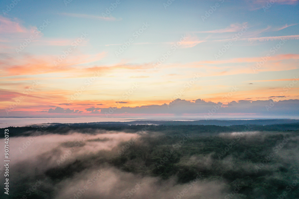 Fototapeta premium Boothbay Harbor West at sunset in Summer with a foggy mist aerial drone