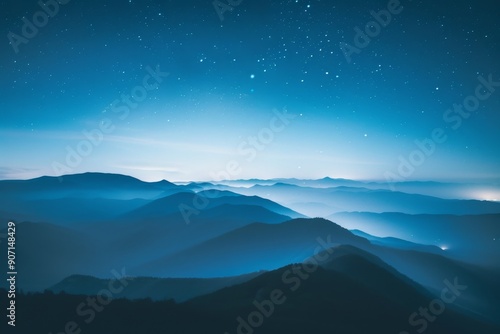 a mountain range with a sky full of stars, serene sunrise over a tranquil mountain range photo