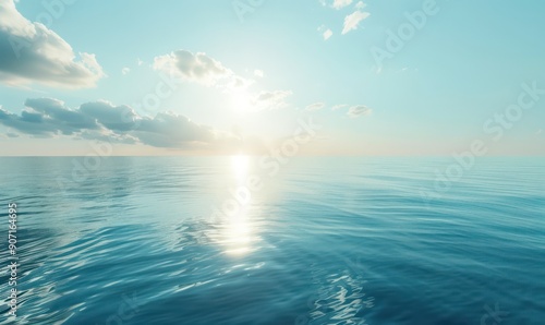 Tranquil sea sparkles under gentle sun rays and soft clouds