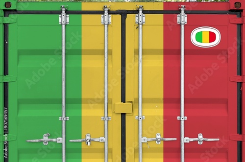 Mali flag depicted on metal doors of shipping cargo container outdoors in docks area close up