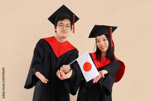 Young Asian graduates with ...