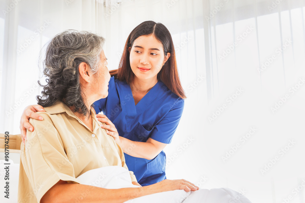 Female doctor nurse take care elderly female patient who is being treated for discomfort due congenital disease gently supporting her shoulder to help her sleep : Elderly health insurance. Female doctor nurse take care elderly female patient who is being treated for discomfort due congenital disease gently supporting her shoulder to help her sleep : Elderly health insurance.
