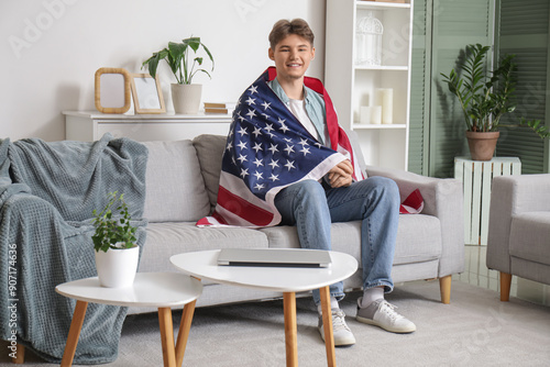 Young man with flag of USA ...