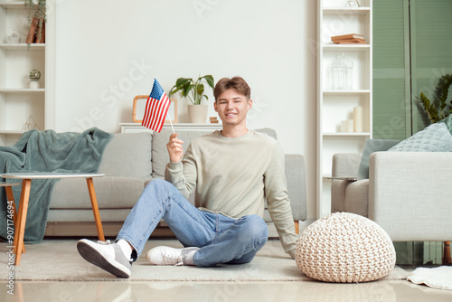 Young man with flag of USA ...