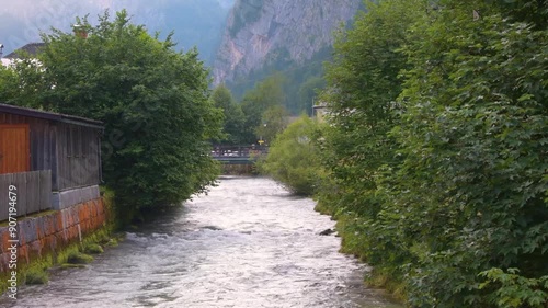 House at the river, Hallstatt, Austria. Riverside. photo