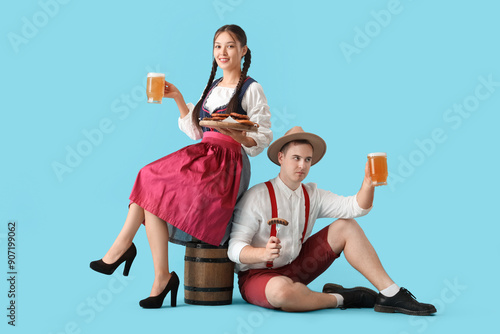 Young happy couple in tradi...