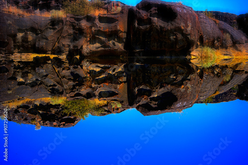 Abstract shapes, reflections, geometry, and geological patterns of volcanic rocks at Shoshone Falls in Southern Idaho's Snake River Canyon, USA photo