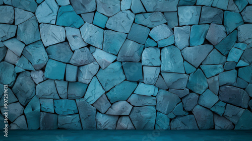 A clean, blue stone wall featuring an array of textured stones, perfect for backgrounds and design projects. photo