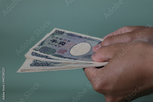 isolated photo of banknote and coin yen currency for payment