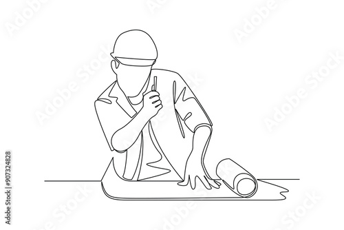 construction worker opens a piece of paper. Labor Day