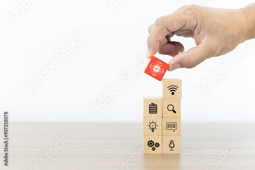 Hand choose AI Artificial Intelligence technology digital icon on wooden block stack for business industry analysis learning and communication system or automation robotic programming and futuristic.